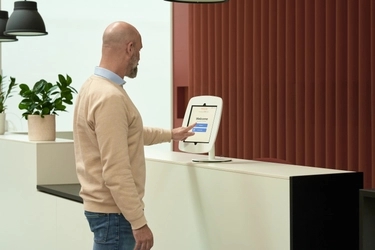 Precise Visit by EastCoast self-service kiosk for check-in of office visitors in the reception or entrance area.